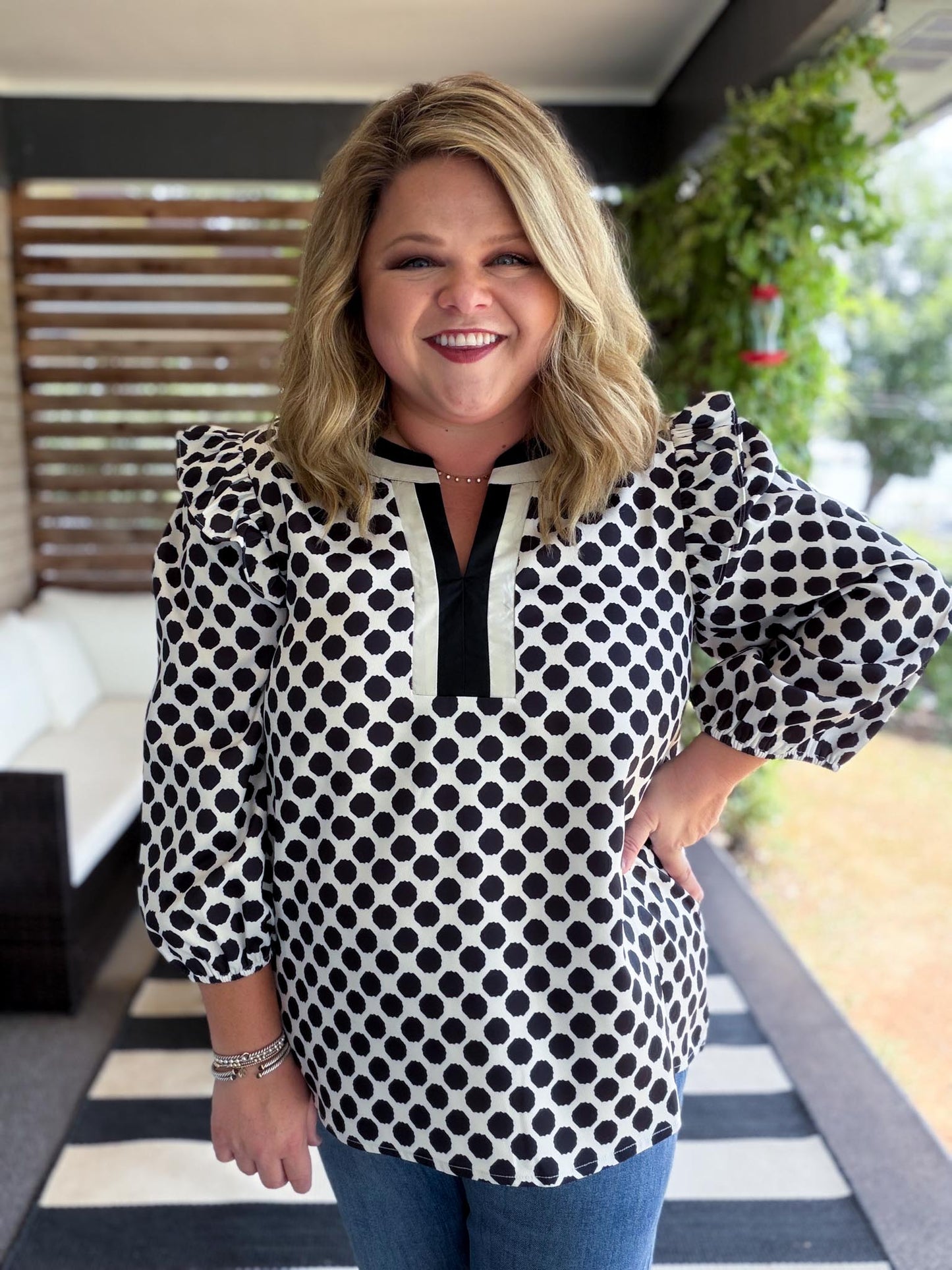 The New Neutral Plus-Size Black Polka Dot Top