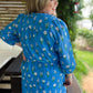 Petal Pop Plus-Size Floral Drawstring Midi Dress