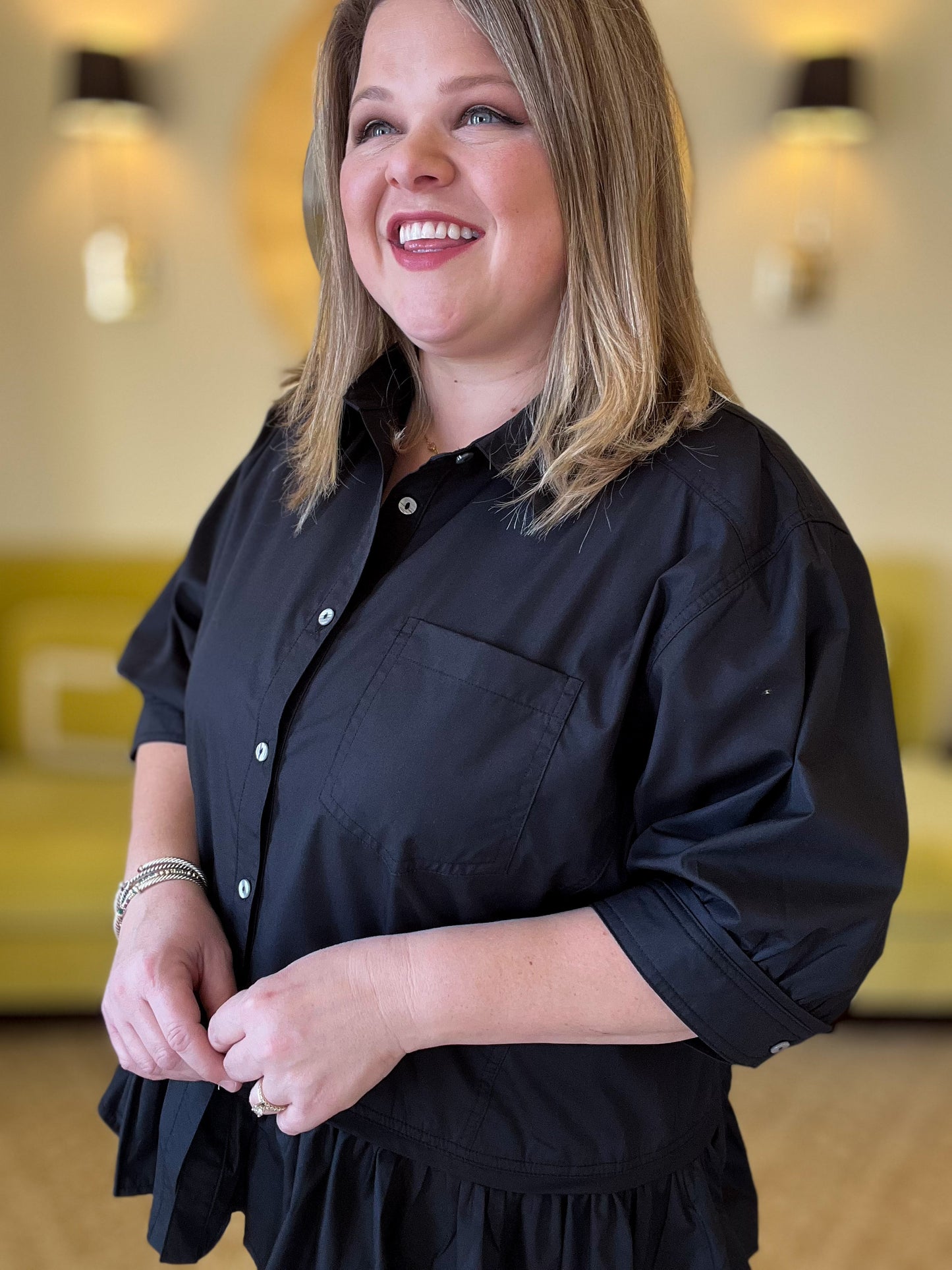 The Essential Curvy Black Ruffle Button Top