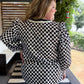 The New Neutral Plus-Size Black Polka Dot Top