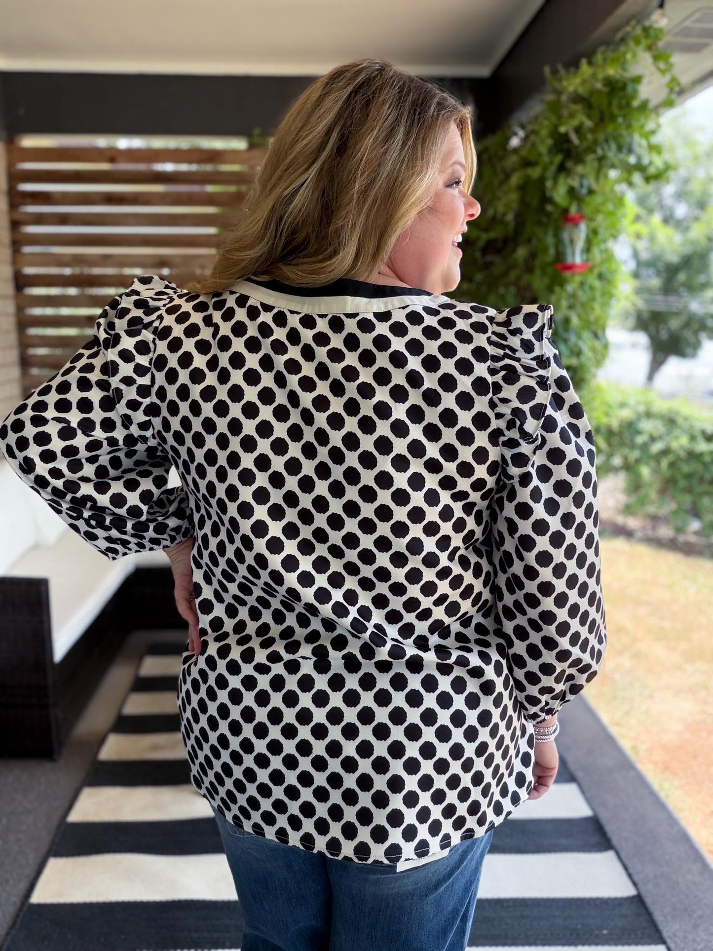 The New Neutral Plus-Size Black Polka Dot Top