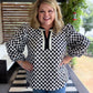 The New Neutral Plus-Size Black Polka Dot Top