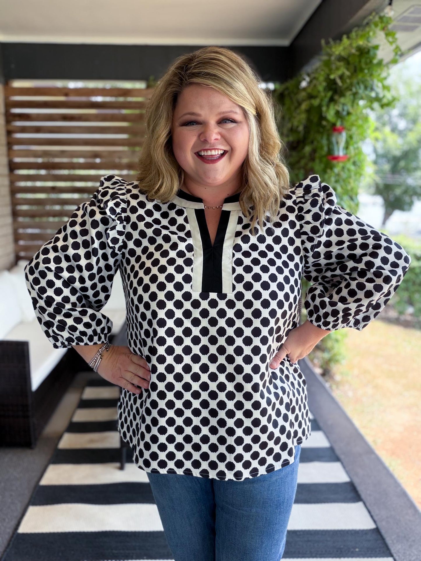The New Neutral Plus-Size Black Polka Dot Top