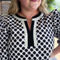 The New Neutral Plus-Size Black Polka Dot Top