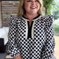 The New Neutral Plus-Size Black Polka Dot Top