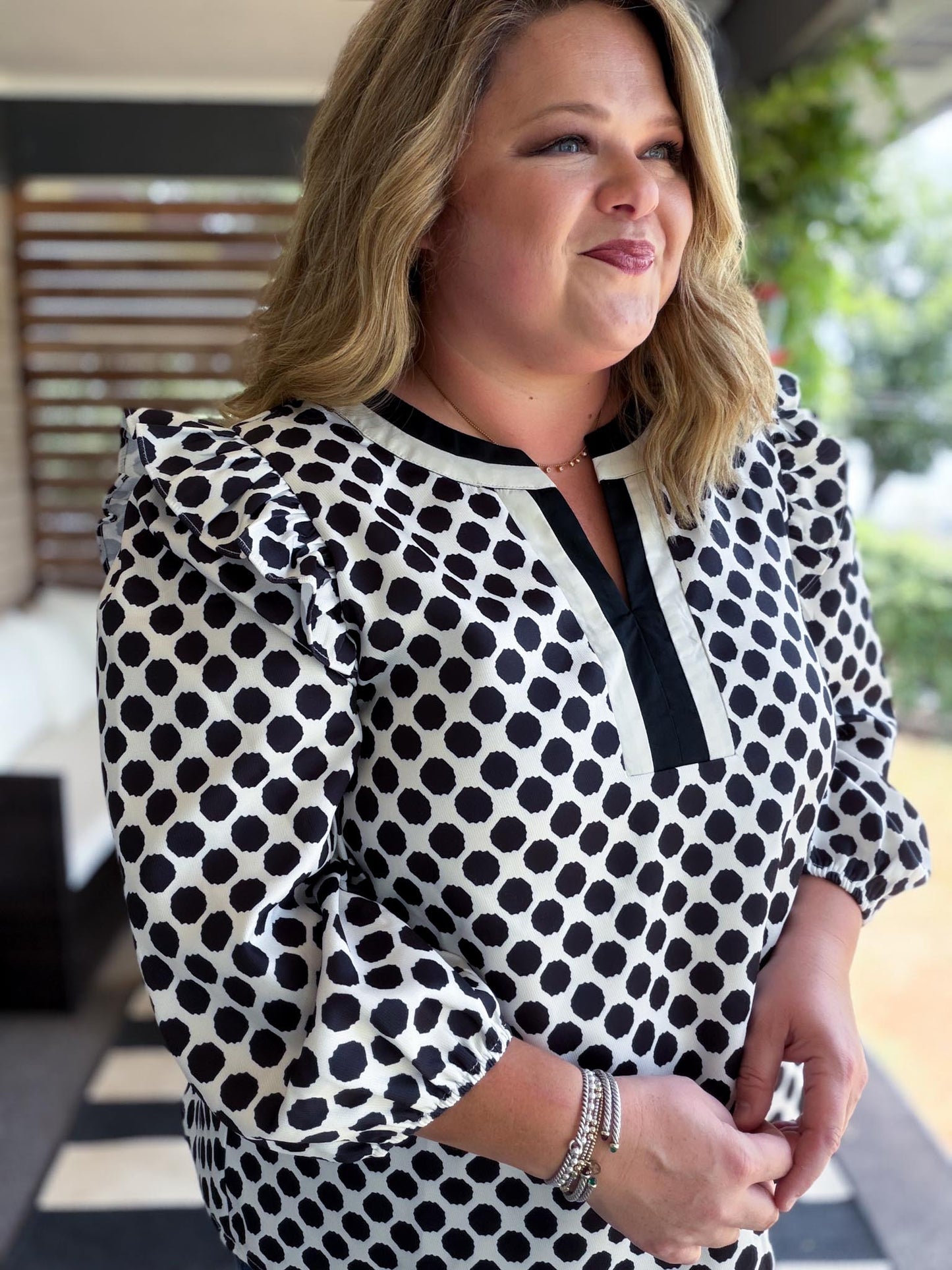 The New Neutral Plus-Size Black Polka Dot Top